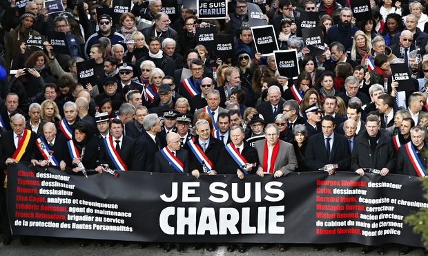 Officials join hundreds of thousands of people on a Je Suis Charlie march in Nice, France